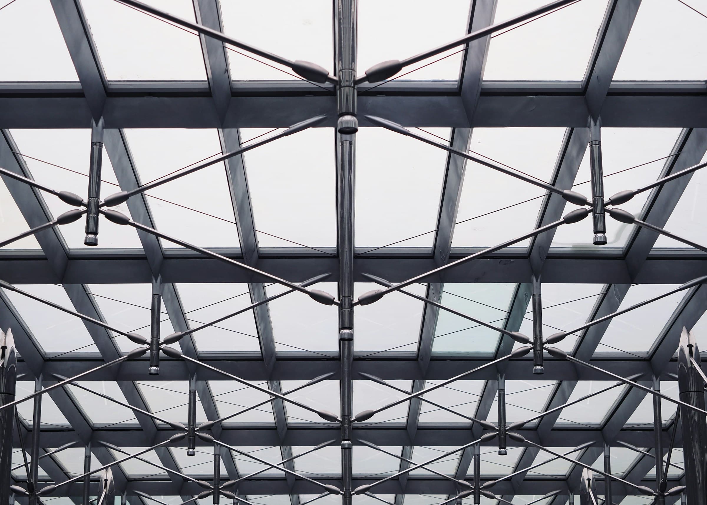 Repeating steel lattice structure.
