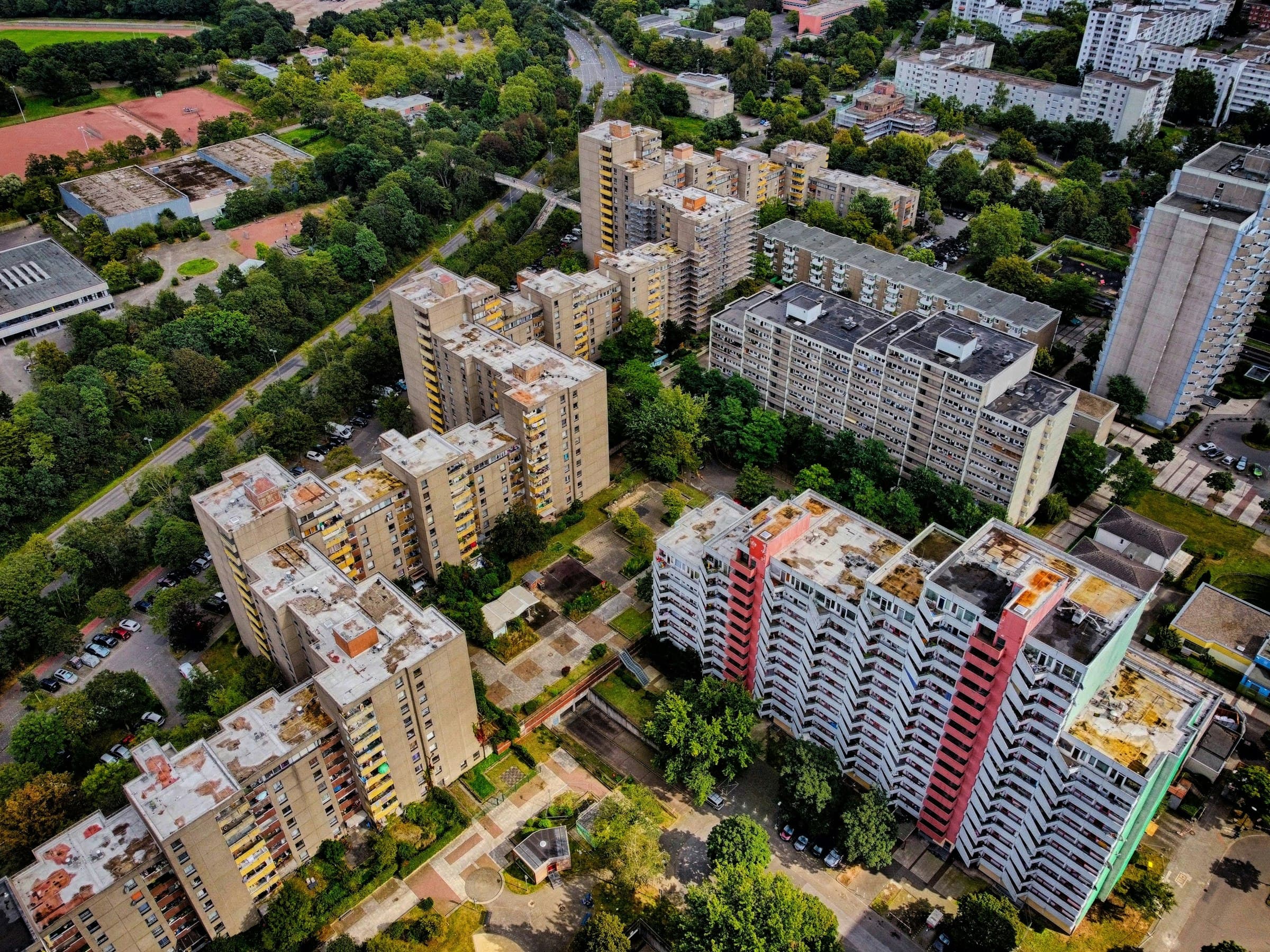 Apartment blocks in Köln-Chorweiler seen from a drone at dusk.